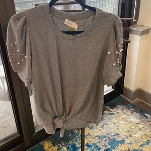 Top with ruffle sleeves